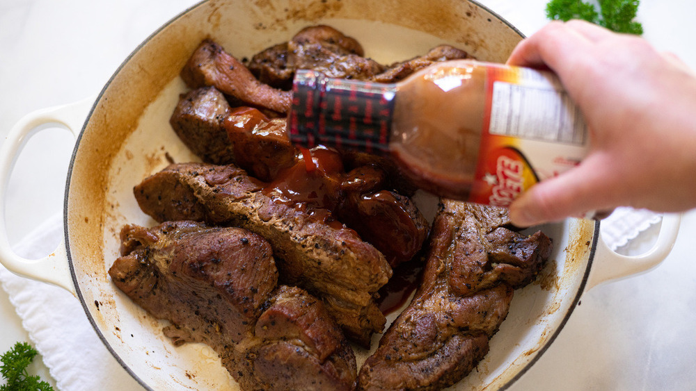 bbq sauce poured over easy country-style ribs