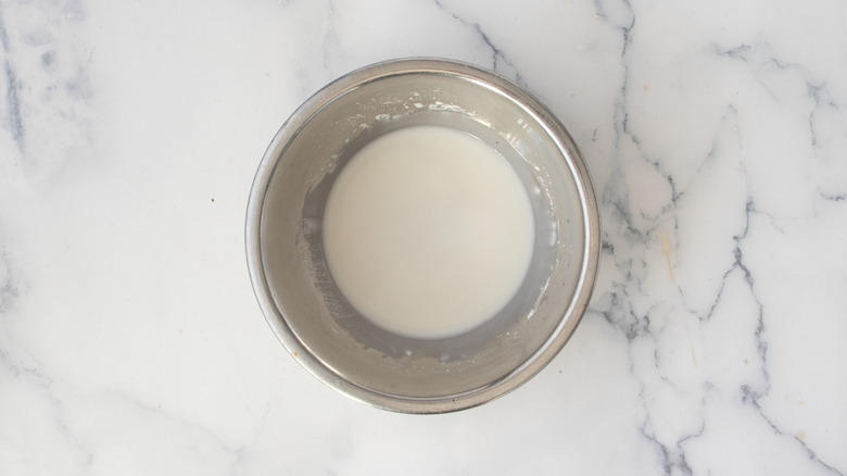 cornstarch and water slurry in a metal bowl