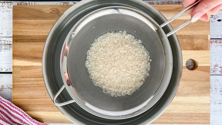 white rice in strainer