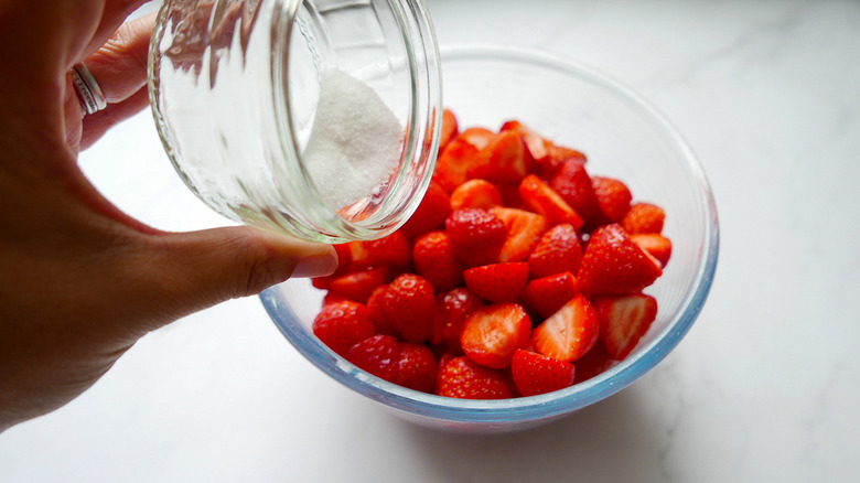 eton mess prepping the strawberries