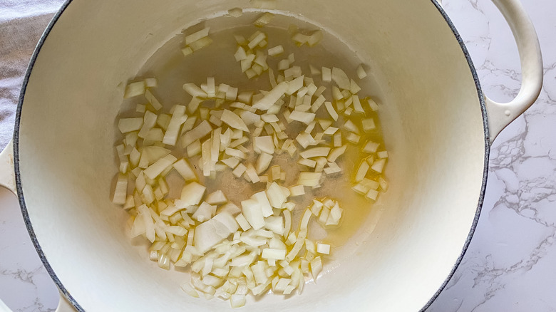 Diced onions in a Dutch oven