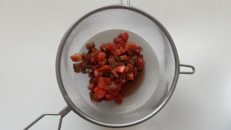 diced tomatoes in colander