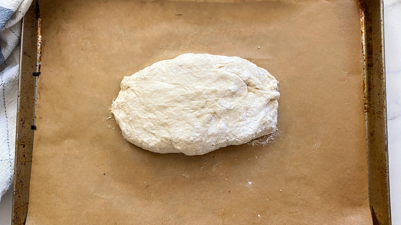 raw dough on baking sheet 