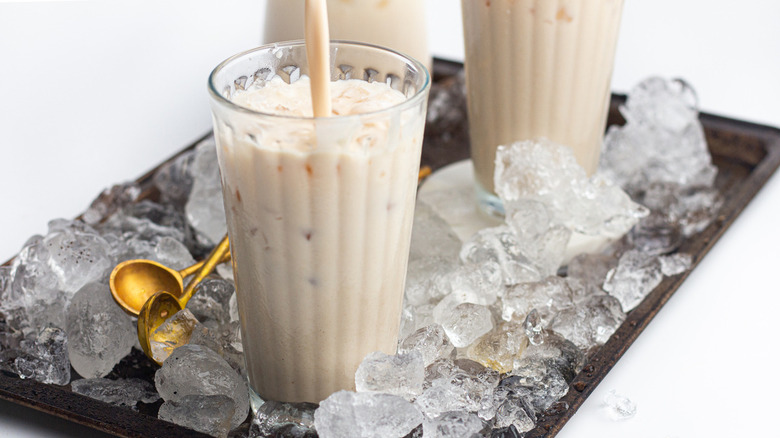 Glasses of horchata posed on tray of ice