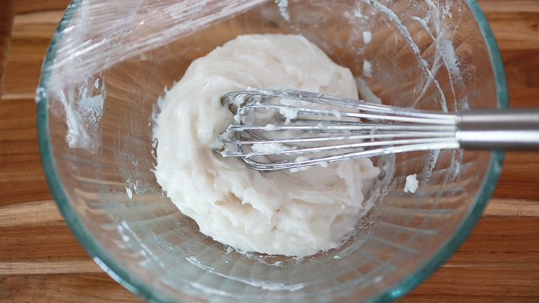 mochi dough in bowl with whisk