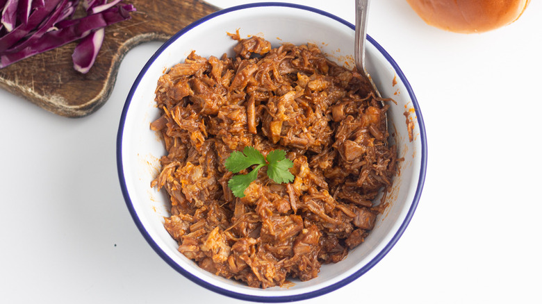 Pulled pork sitting in a bowl