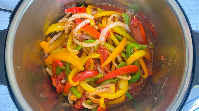 italian seasoning on peppers and onion