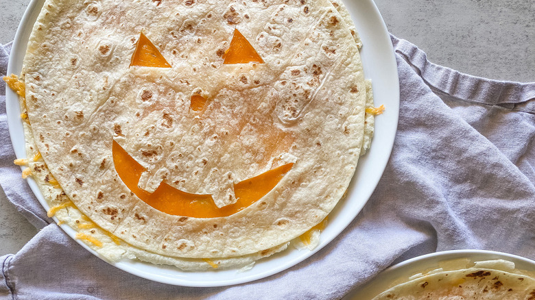 jack-o'-lantern quesadilla on plate