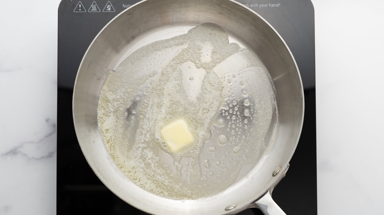 Melted butter in a skillet