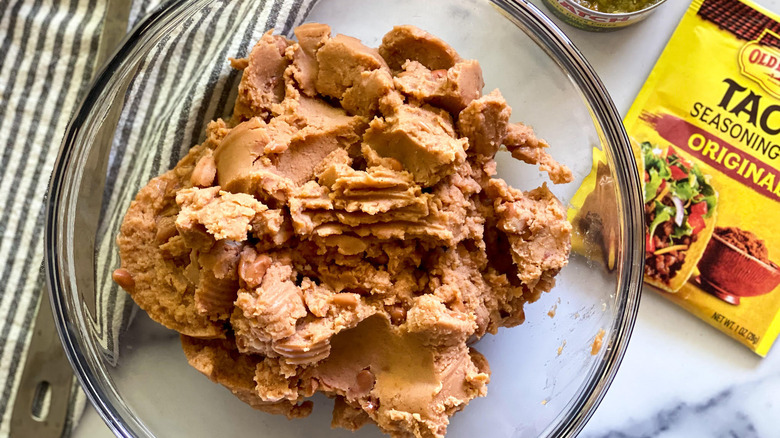 Canned refried beans mix in bowl