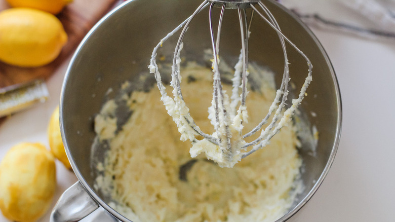 mixing lemon shortbread cookie ingredients