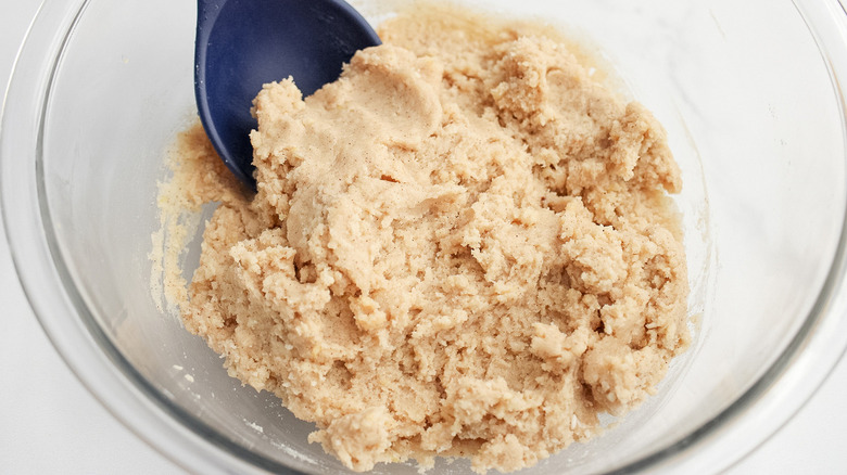 prepping the dough for the crust