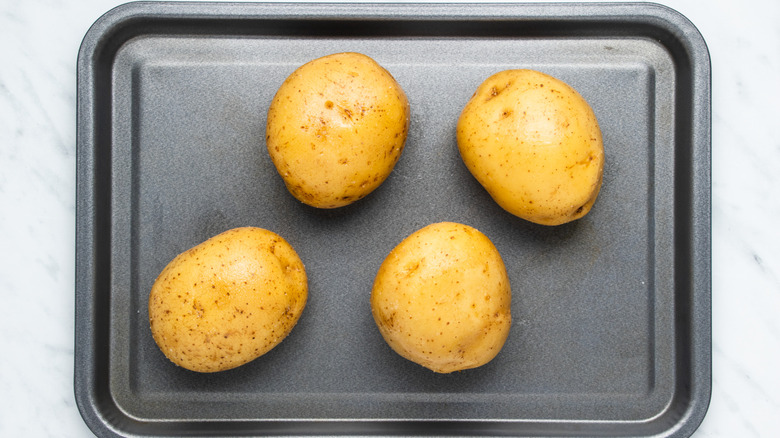 potatoes on baking sheet