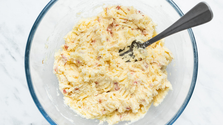 cheesy mashed potatoes in bowl