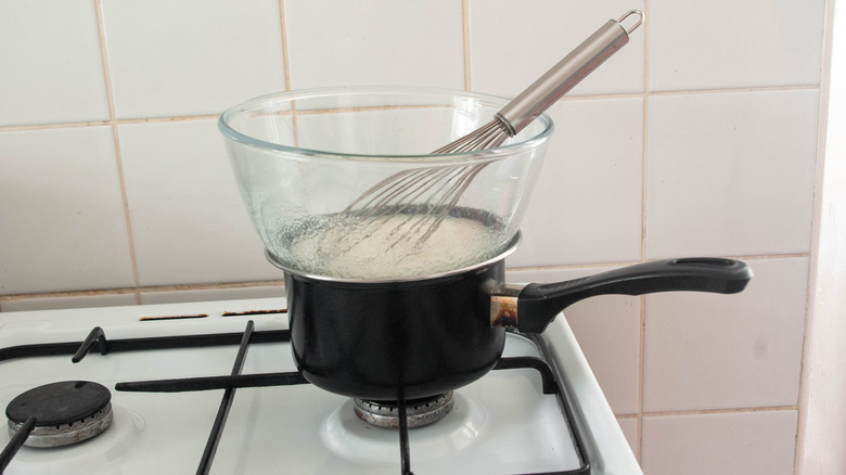 pot with glass bowl on top