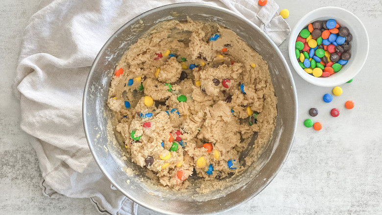 M&M cookie batter in a large bowl