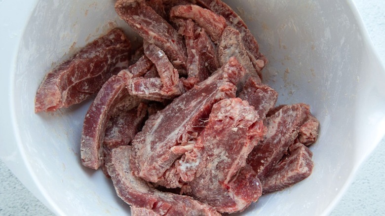 sliced steak in bowl