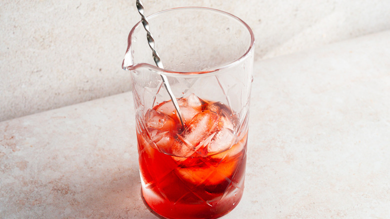 negroni with ice and spoon