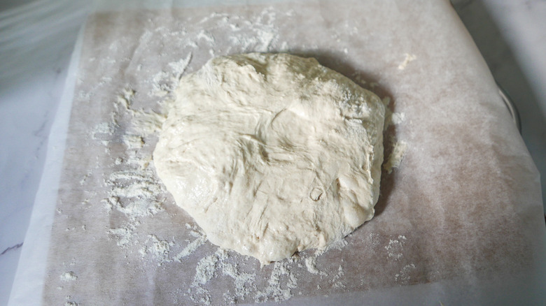 bread dough on wooden board