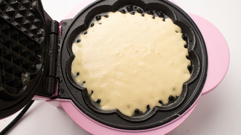 waffle batter on waffle iron