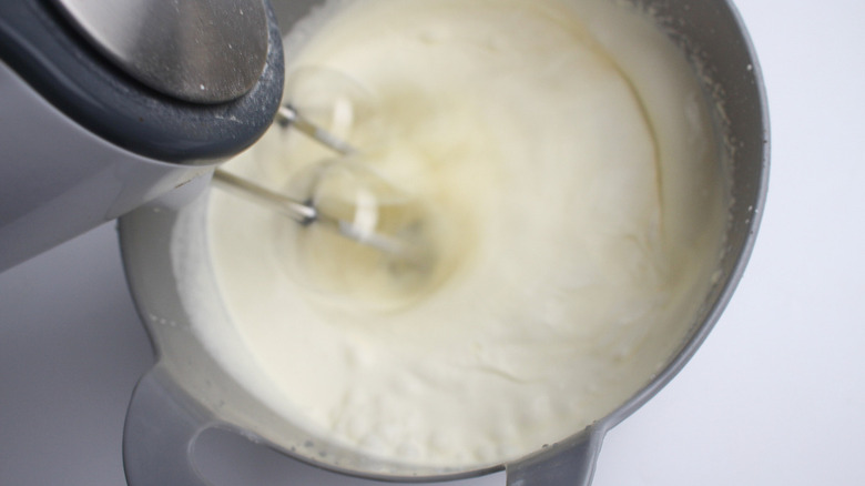 mix heavy cream and cream cheese