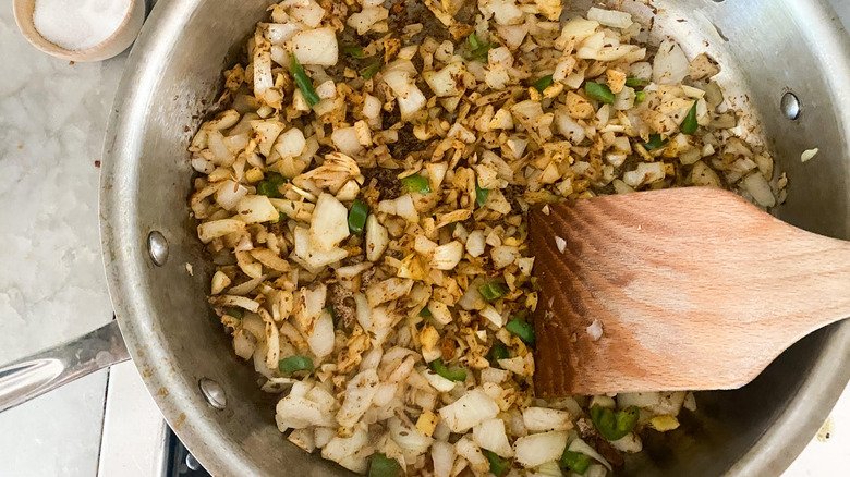 pan of onions, garlic, ginger, pepper, with spices