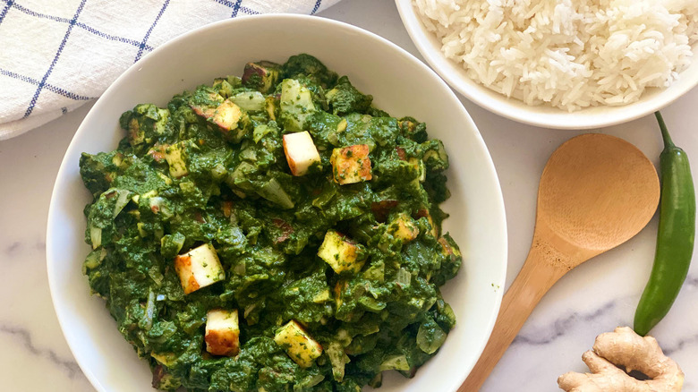 plate with palak paneer and rice