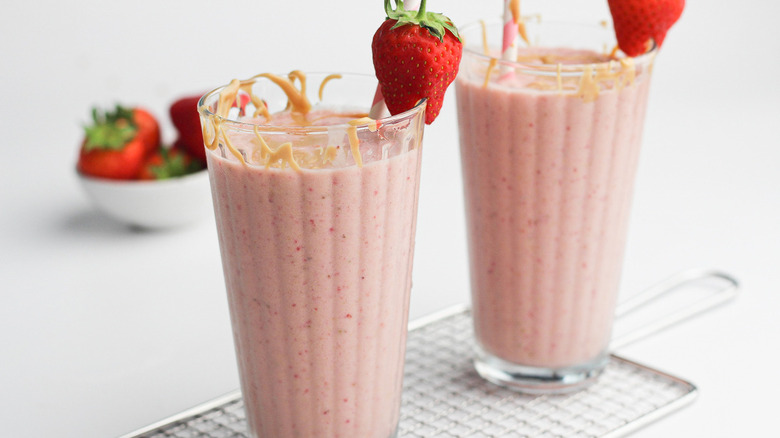 smoothies with strawberry garnish