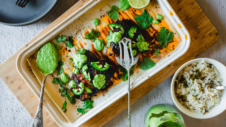 Peruvian chicken on baking sheet