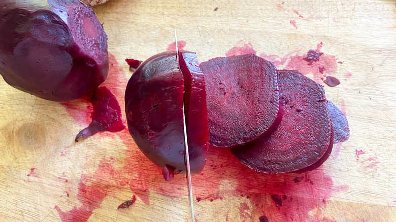 slicing cooked beets