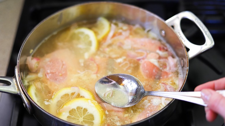 salmon poaching in broth