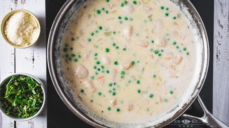 alfredo sauce in pan