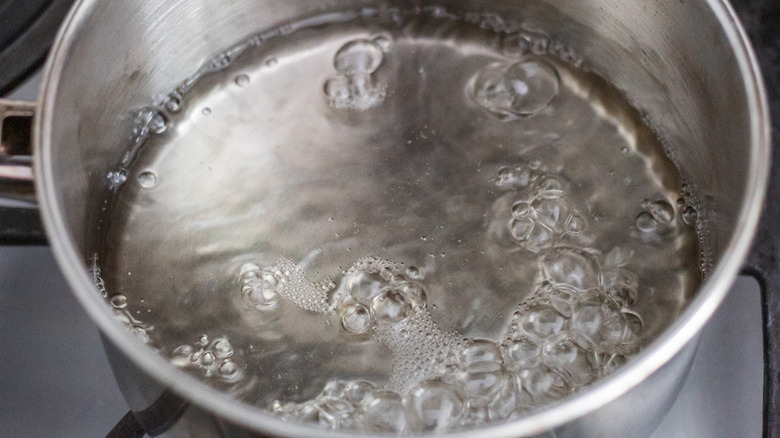 sugar syrup heating in pan