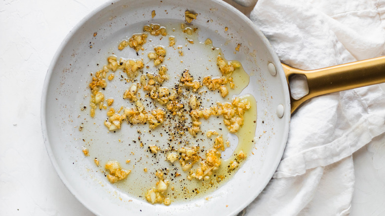 garlic cooking in pan