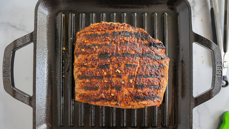 grilled meat in skillet