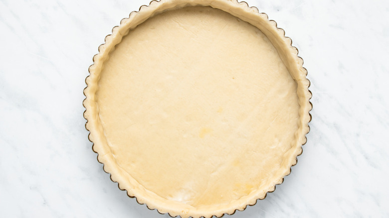 unbaked pie crust in pan