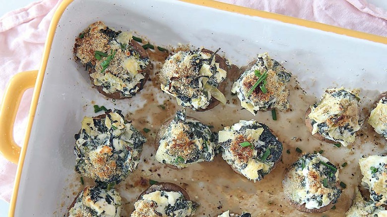 stuffed mushroom in baking dish 