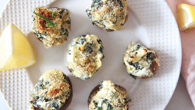 stuffed mushrooms on white plate 