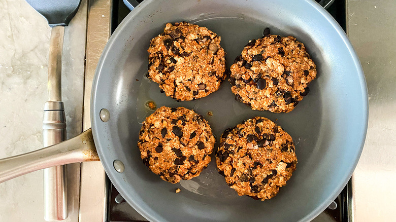 tofu burgers in skillet