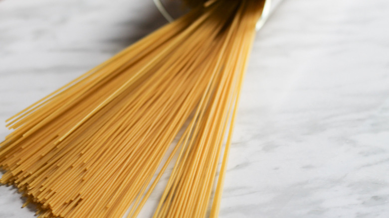 dry spaghetti pasta on counter