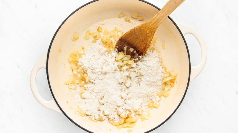 Onions and flour frying in pot