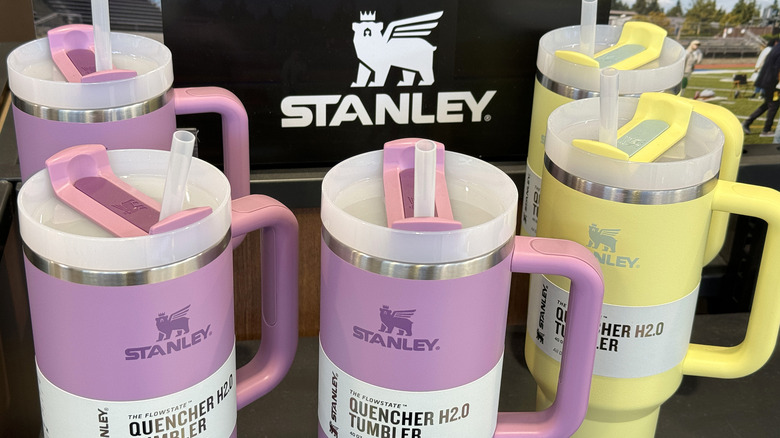 purple and yellow Stanley tumblers