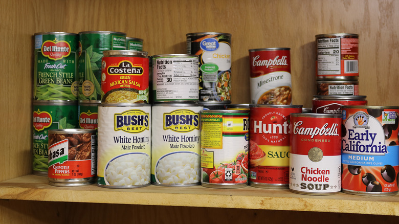 Canned foods on pantry shelf