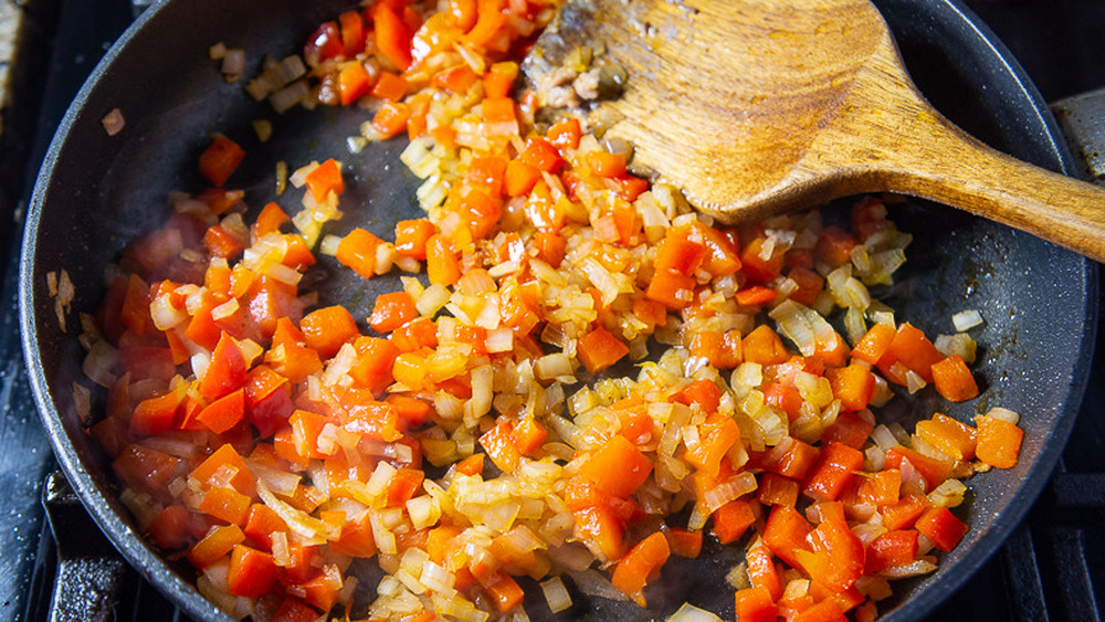 peppers and shallots in pan