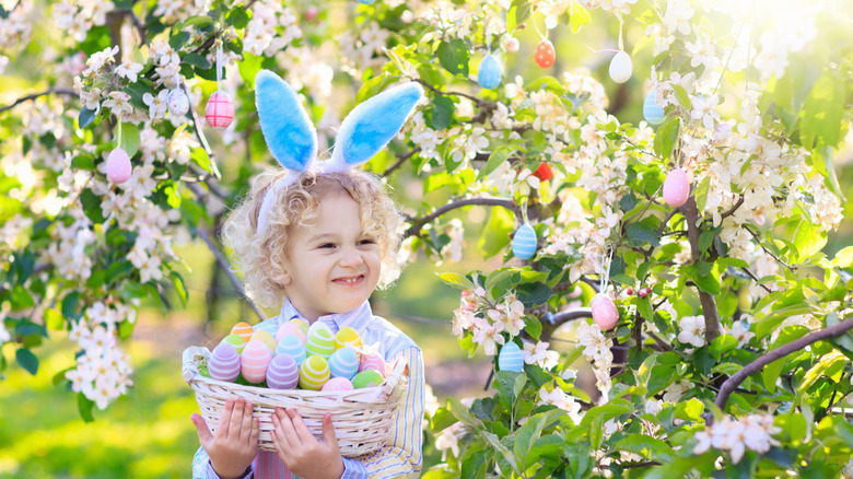 Easter egg tree decoration boy bunny ears garden