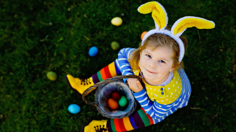 Easter egg hunt child basket color egg evening