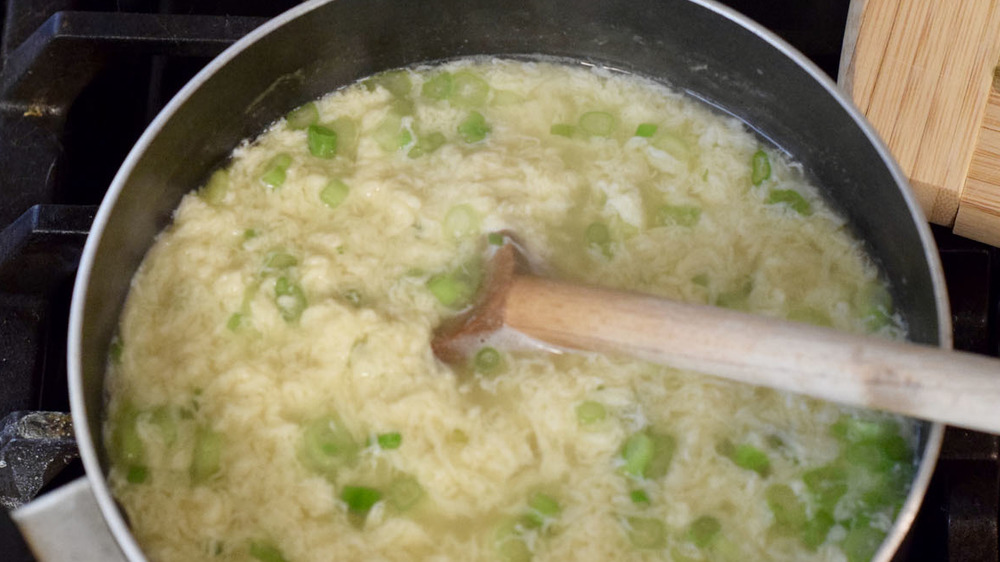 egg drop soup broth in pot