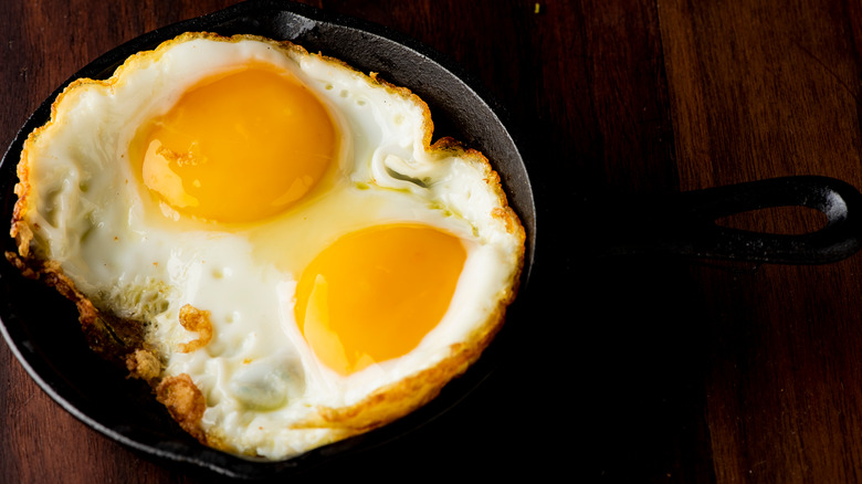 fried eggs sunny-side up skillet