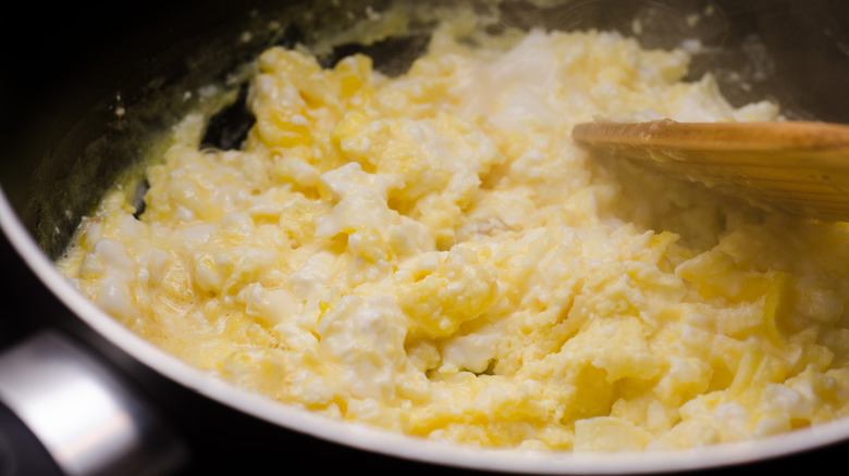 scrambled egg wooden utensil pan