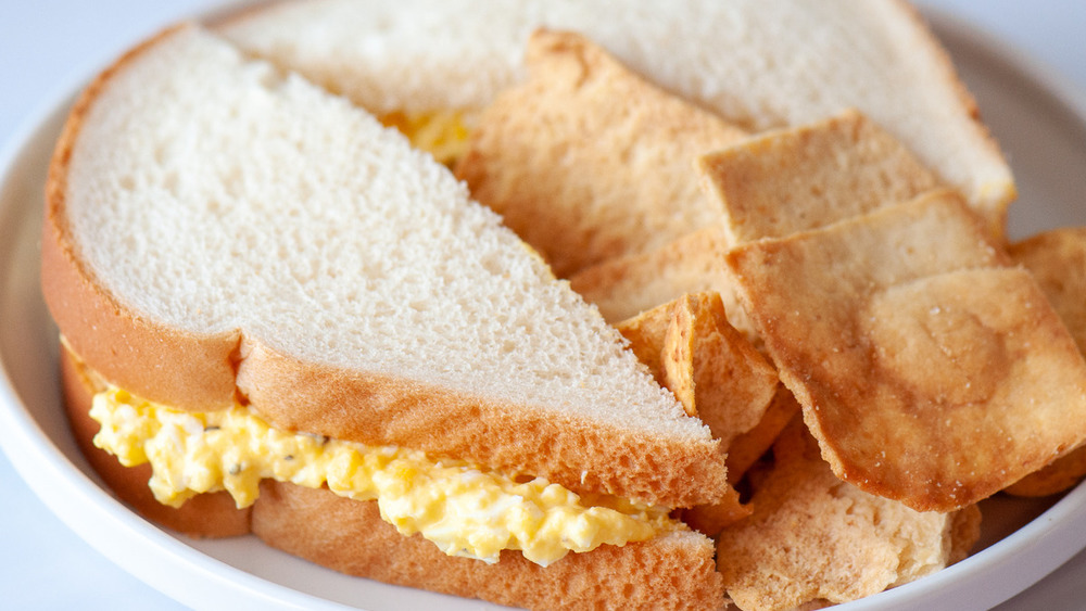 egg salad recipe and chips plated